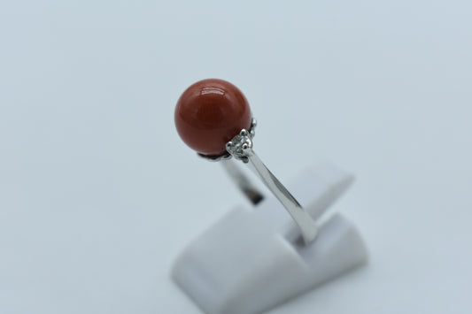 Anello con sfera corallo
