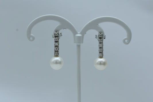 Orecchini pendenti con perla